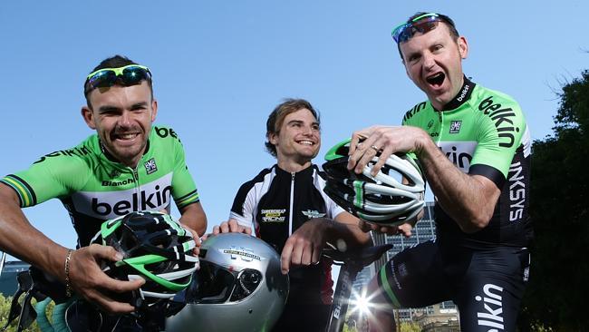 V8 Supercar driver Tim Slade, centre, with Tour Down Under's Jack Bobridge, left, and Graeme Brown. Slade is set to ride in the Bupa Challenge. Picture: Sarah Reed. 