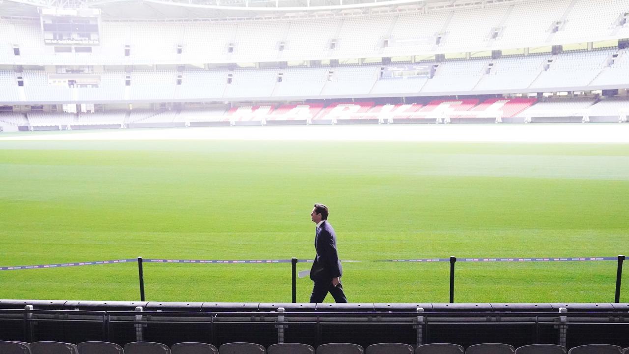 Gillon McLachlan walks through an empty Marvel Stadium in June. Picture: AAP Image/Michael Dodge