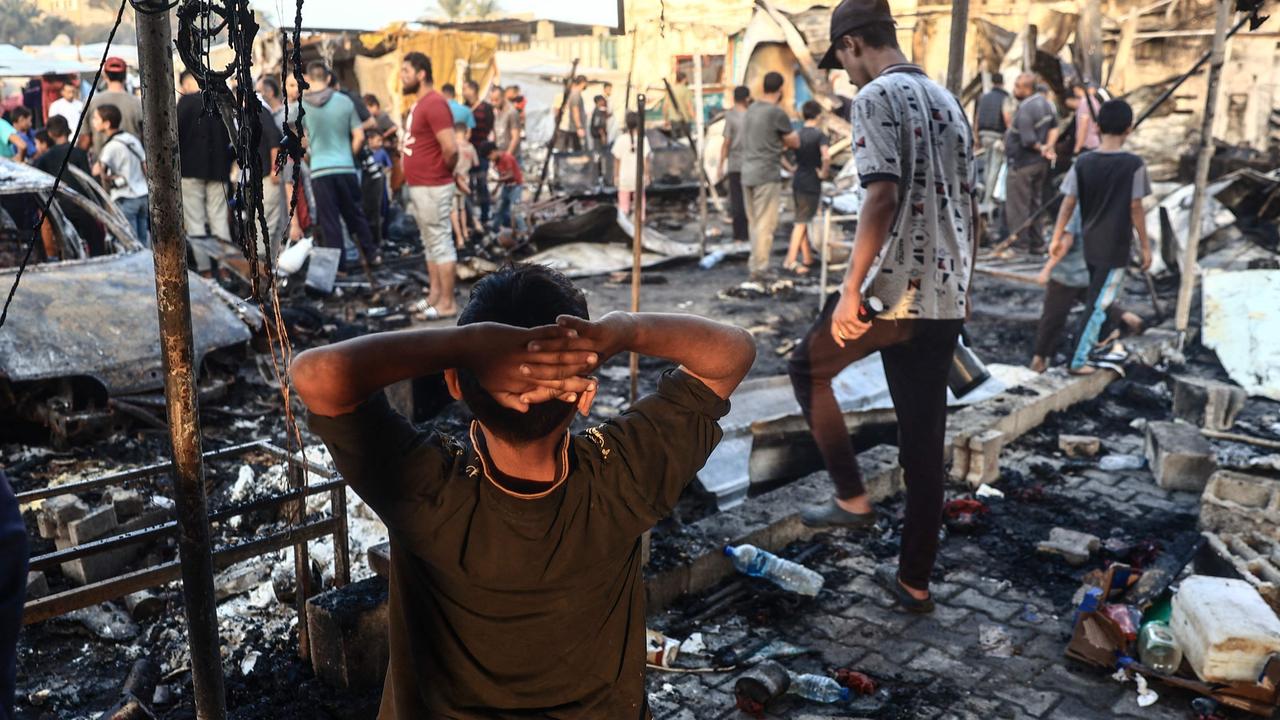 Palestinians check the destruction after an Israeli strike on the Al-Aqsa hospital in Deir al-Balah. Picture: Eyad Baba/AFP