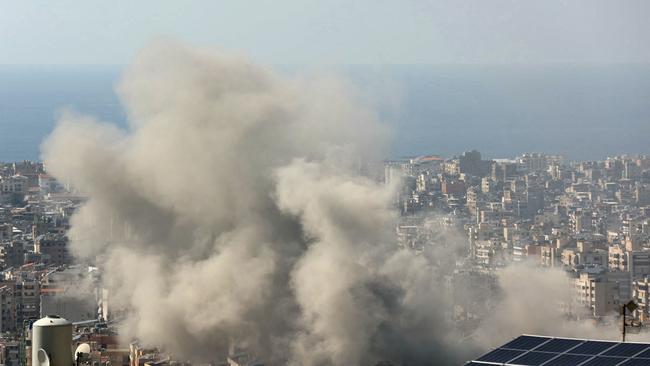 he repsonse: Smoke billows following an Israeli airstrike that targeted Beirut's southern suburbs this month. Picture: AFP