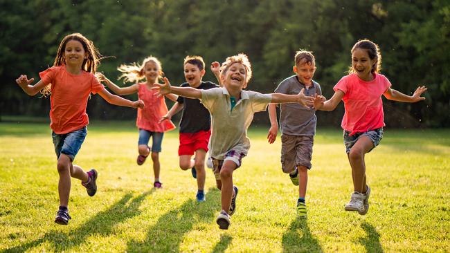 CHILDREN NATURE -  Group of beauty kids running to camera in public park Picture: Istock