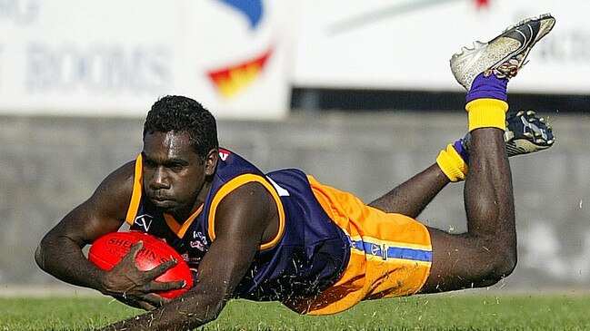 Relton Roberts dives for a mark while playing interleague football for the Goulburn Valley league.