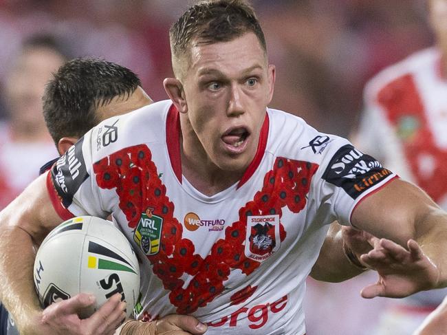 Cameron McInnes of the Dragons is tackled during the Round 8 NRL match between the St George Illawarra Dragons and the Sydney Roosters at Allianz Stadium in Sydney, Wednesday, April 25, 2018. (AAP Image/Craig Golding) NO ARCHIVING, EDITORIAL USE ONLY