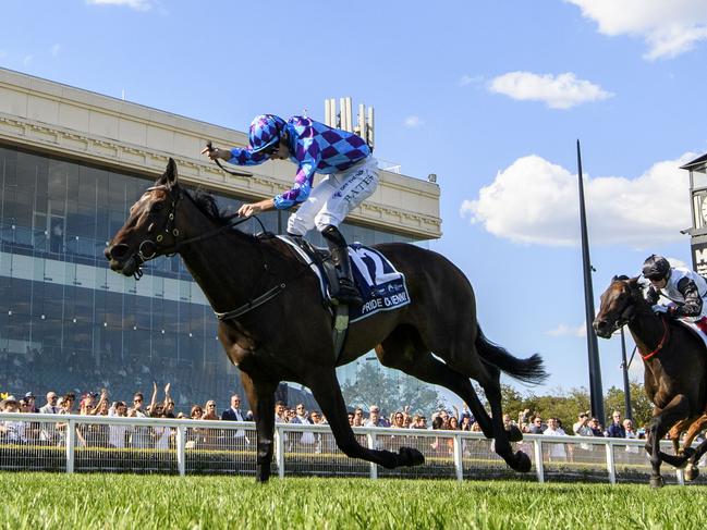 MELBOURNE, AUSTRALIA - MARCH 16: Declan Bates riding Pride of Jenni defeats Craig Williams riding Mr Brightside and Cascadian in Race 8, the The Sharp Eit All-star Mile, during The All-Star Mile Race Day at Caulfield Racecourse on March 16, 2024 in Melbourne, Australia. (Photo by Vince Caligiuri/Getty Images)