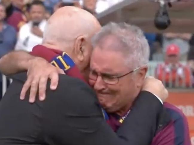 Leigh Matthews and Chris Fagan embrace after the grand final. Picture: Channel 7