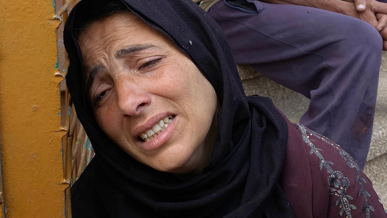 A Palestinian woman mourns a relative killed in Israeli strikes, at the Nasser hospital in Khan Yunis in the southern Gaza Strip on May 15, 2025. (Photo by AFP)