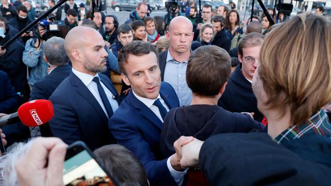 France's President Emmanuel Macron greets supporters in Carvin, northern France, on Monday. Picture: AFP