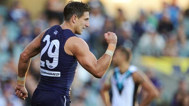 Matthew Pavlich celebrates a goal in the final quarter.