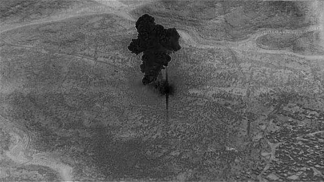 An image from a remotely piloted aircraft focused on the compound of Islamic State leader Abu Bakr al-Baghdadi as it is destroyed after the raid.