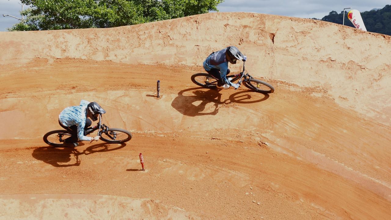 Jonathan Simek and Jayce Cunning compete in the Speed &amp; Style competition on Day Two of the Crankworx Cairns mountain bike festival, held at the Smithfield Mountain Bike Park. Picture: Brendan Radke