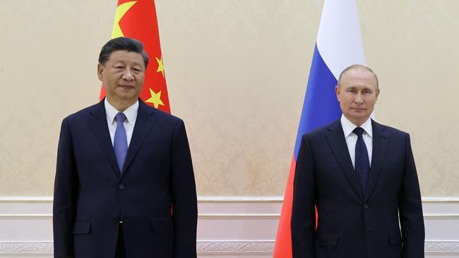 China's Xi Jinping and Vladimir Putin pose together in Uzbekistan at the Shanghai Co-operation Organisation Summit. Picture: Alexandr Demyanchuk / SPUTNIK / AFP