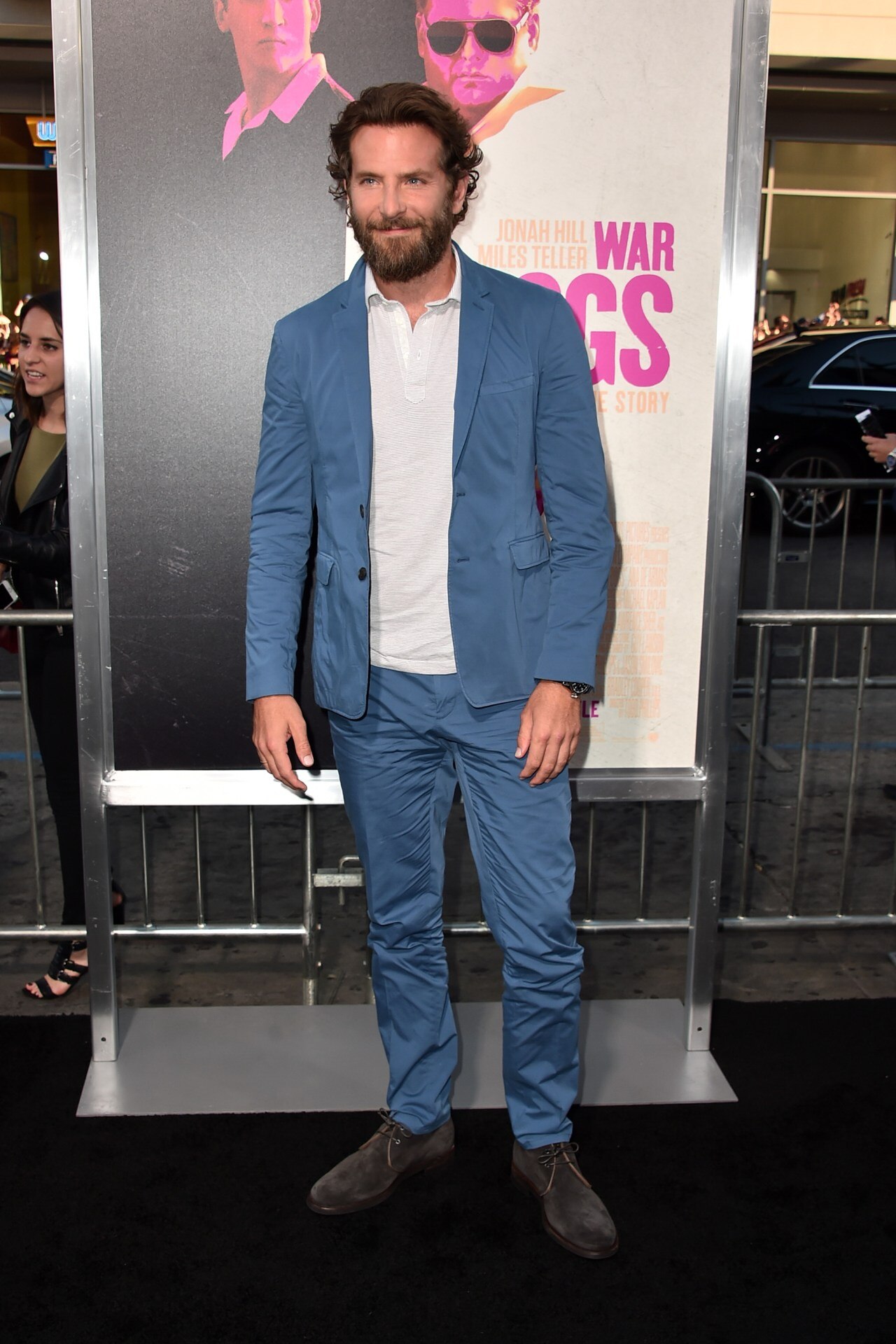 <h3>2016</h3><p>&nbsp;</p><p>Wearing a polo shirt underneath a suit is not a look for every occasion, Cooper shows us that with the right suit, in this case a casual blue one, it can be done.&nbsp;</p>