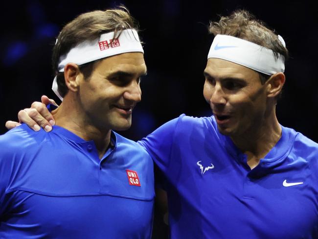 LONDON, ENGLAND - SEPTEMBER 23: Roger Federer and Rafael Nadal of Team Europe interact during the doubles match between Jack Sock and Frances Tiafoe of Team World and Roger Federer and Rafael Nadal of Team Europe during Day One of the Laver Cup at The O2 Arena on September 23, 2022 in London, England. (Photo by Clive Brunskill/Getty Images for Laver Cup)