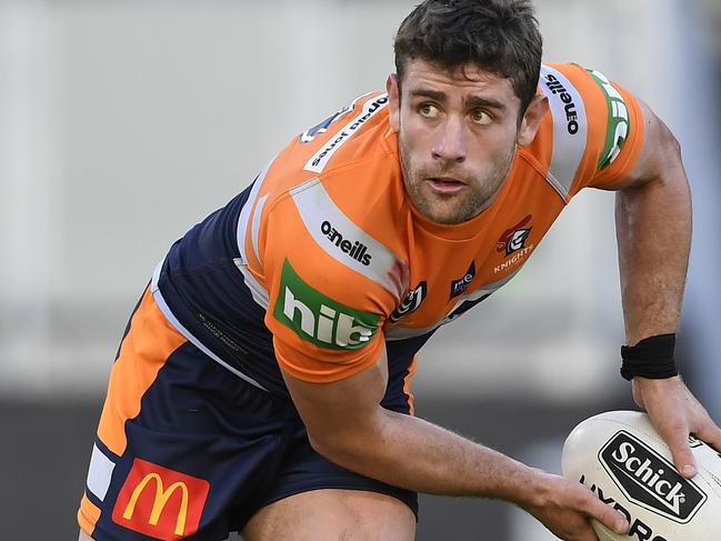 TOWNSVILLE, AUSTRALIA - JUNE 27: Andrew McCullough of the Knights looks to pass the ball during the round seven NRL match between the North Queensland Cowboys and the Newcastle Knights at QCB Stadium on June 27, 2020 in Townsville, Australia. (Photo by Ian Hitchcock/Getty Images)