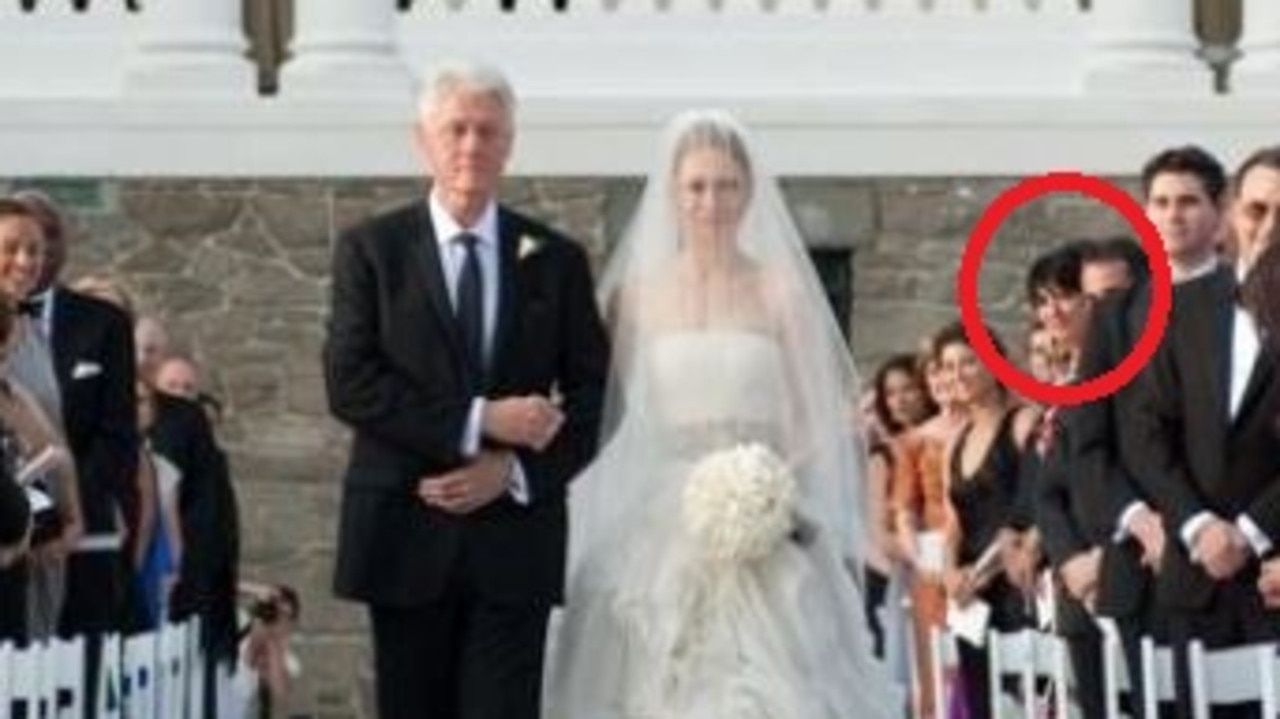 President Bill Clinton walking his daughter Chelsea down the isle for her wedding on July 31, 2010 which was attended by Ghislaine Maxwell. Picture: AP Photo/Genevieve de Manio Photography