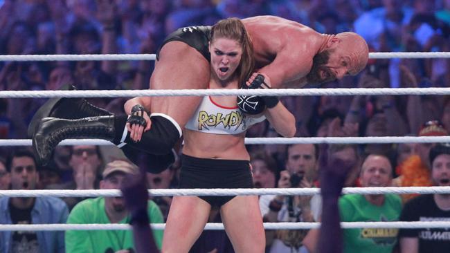 Ronda Rousey wasn’t afraid to mix it up with Triple H at WrestleMania, but she’ll be dealing with The Riott Squad at Super Show-Down. Picture: WWE