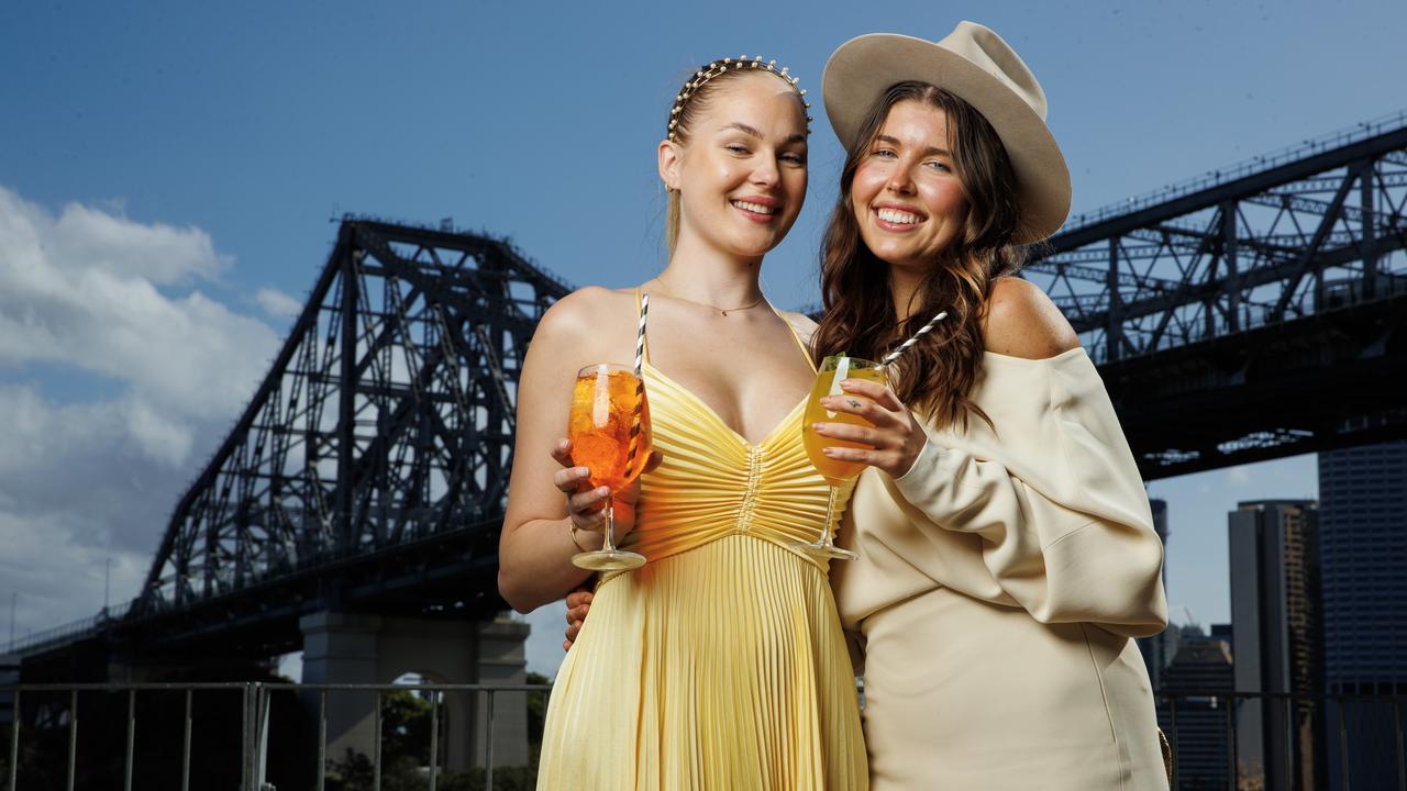 Georgia Payne 21, and Jade Collits 24, will saddle up for Melbourne Cup day at Howard Smith Wharves. Picture Lachie Millard