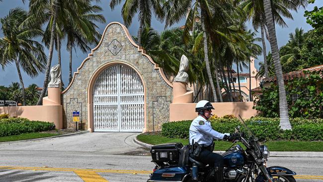 Officers are seen in front of the home of former US President Donald Trump at Mar-A-Lago in Palm Beach, Florida. Picture: AFP