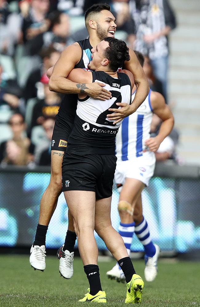 Port Adelaide’s Sam Powell-Pepper celebrates his goal with Jarman Impey. Picture: SARAH REED