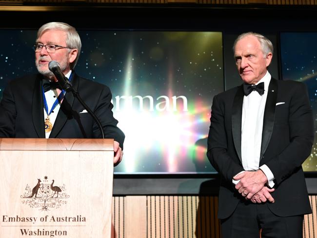 Greg Norman receives an award from Kevin Rudd at the Australia Day gala in Washington DC. SUPPLIED