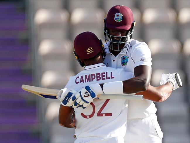 West Indies' Jason Holder (right) and John Campbell celebrate their Test win on English soil.