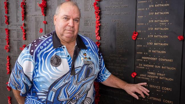 Australian War Memorial Indigenous liaison officer Michael Bell beside Private Ngakyunkwokka’s name on the Roll of Honour. Picture: Supplied / Australian War Memorial