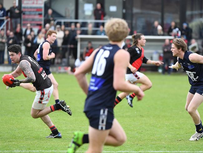 Frankston's Zac Longham with the ball.