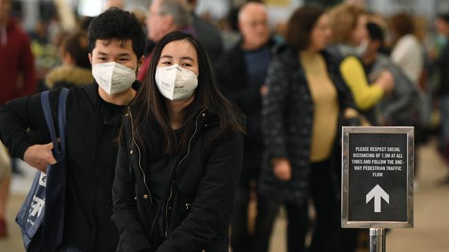 Sydneysiders are being urged to wear masks in shopping centres, on public transport and places of worship. Picture: Joel Carrett