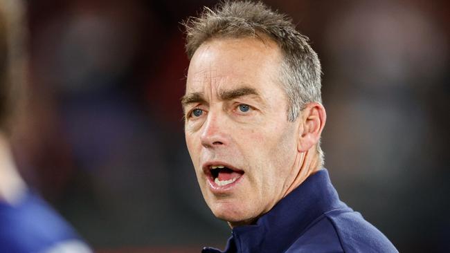 MELBOURNE, AUSTRALIA - MAY 19: Alastair Clarkson, Senior Coach of the Kangaroos addresses his players during the 2024 AFL Round 10 match between the Essendon Bombers and the North Melbourne Kangaroos at Marvel Stadium on May 19, 2024 in Melbourne, Australia. (Photo by Dylan Burns/AFL Photos via Getty Images)