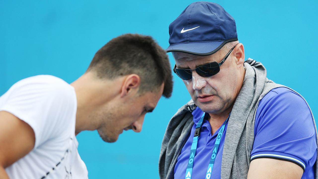 Bernard Tomic with his dad John. (Photo by Michael Dodge/Getty Images)