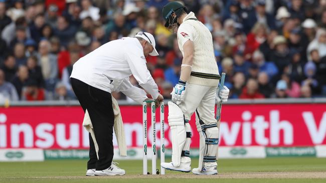 New, heavier bails were required such was the strength of the wind at Old Trafford.