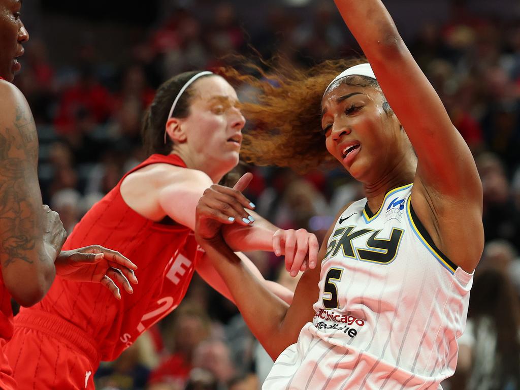 Angel Reese takes a hard foul from Caitlin Clark. Picture: Getty Images