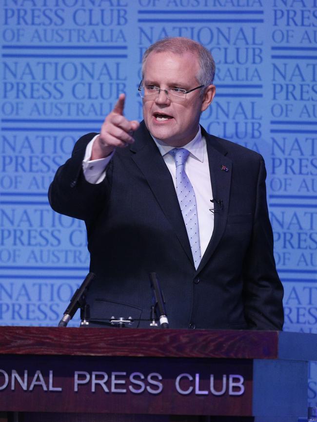 An animated Treasurer's Scott Morrison used his Press Club address to warn the big four of a savage backlash if the tax is passed on. Picture Gary Ramage