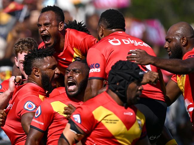 Papua New Guinea players celebrate a try. Picture: NRL Images