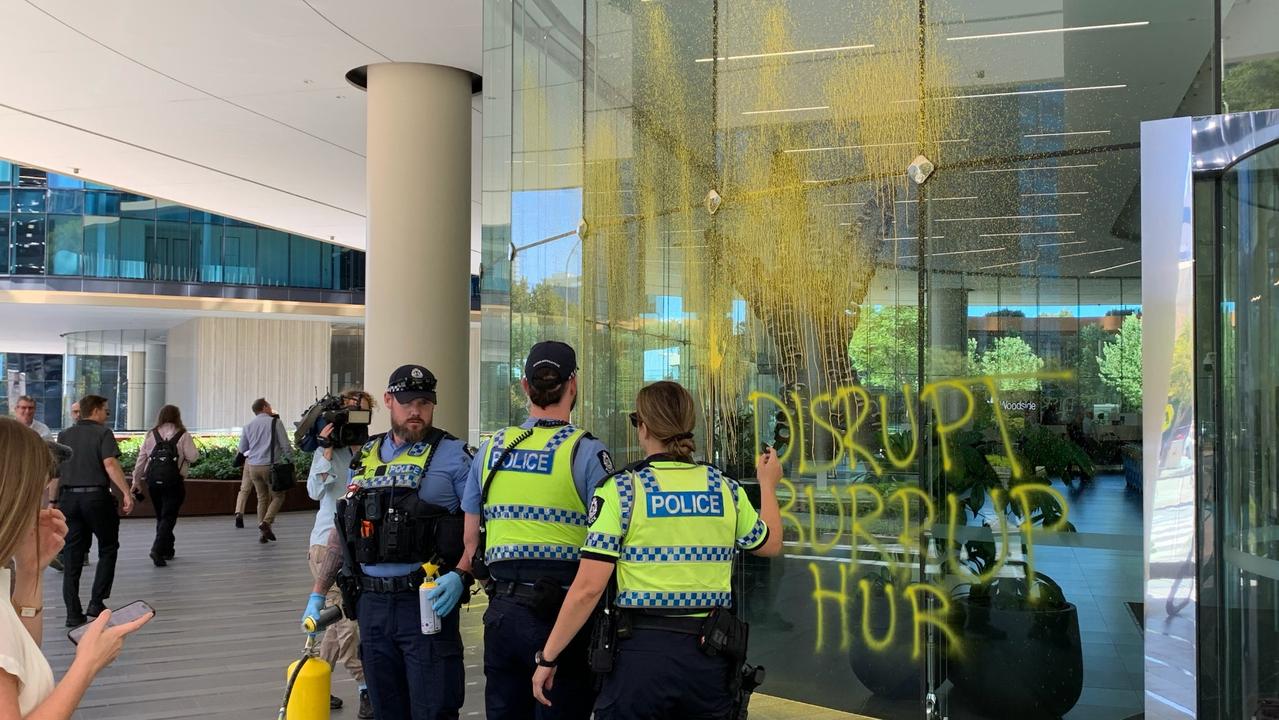 Disrupt Burrup Hub action at Woodside's Perth offices on February 13, over which a 34-year-old man has now been charged.