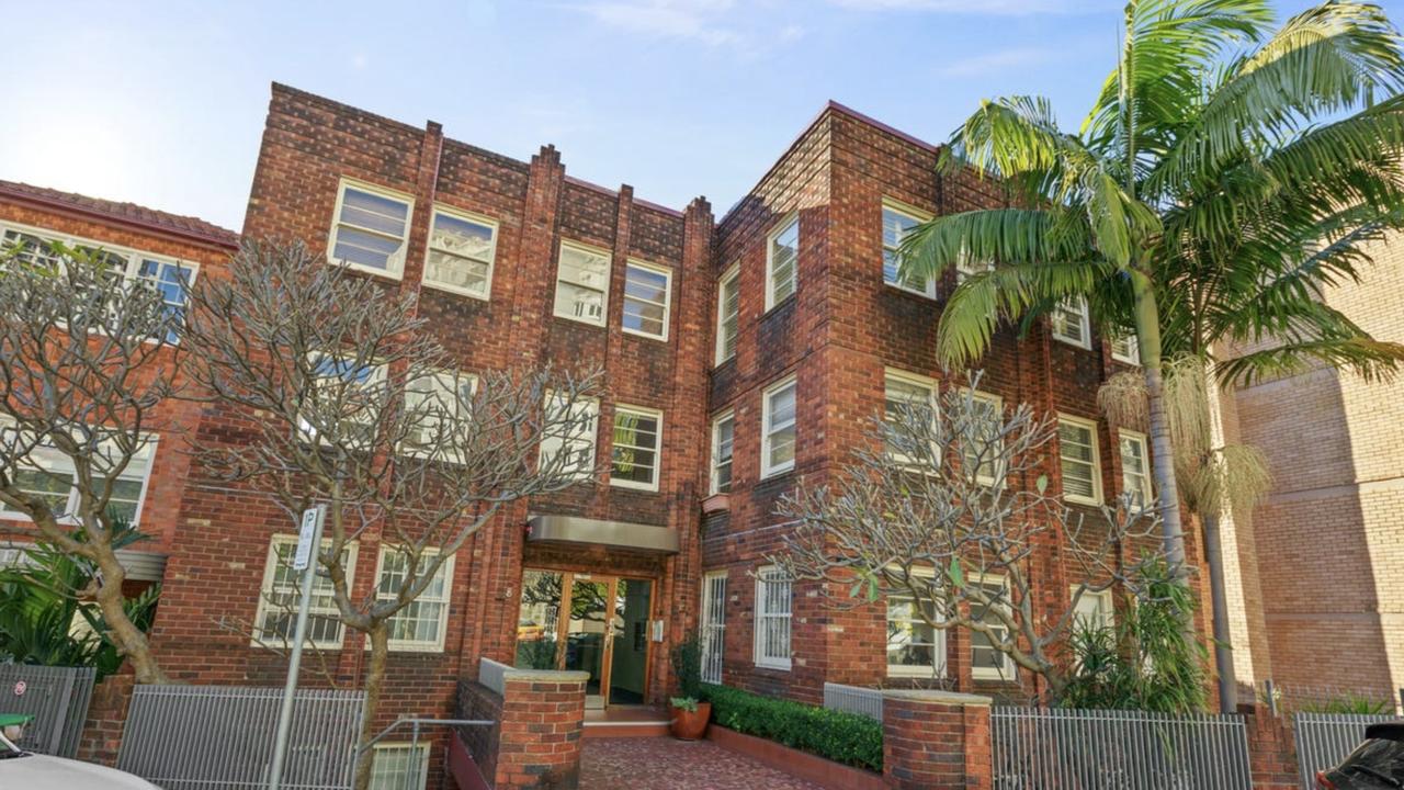 The unit sits inside this lovely art deco building.