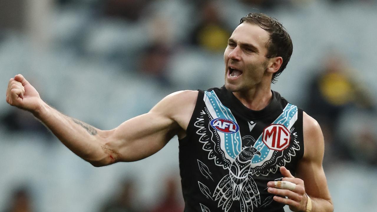 Jeremy Finlayson has become a key force in Port Adelaide’s engine room – driven by a desire to give back to the club that “wrapped its arms around him”. Picture: AFL Photos via Getty Images