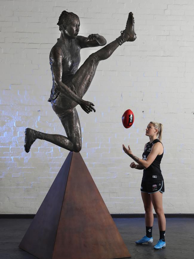 Tayla Harris with her life-size statue, commissioned by NAB. Picture: Alex Coppel.