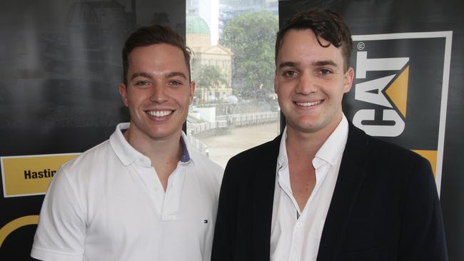 Hastings Deering’s Evan Crisafulli (right) with Hastings Deering sponsored 2022 Porsche Paynter Dixon Carrera Cup racing driver Harri Jones. Picture: Contributed