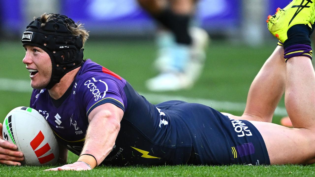 MELBOURNE, AUSTRALIA - SEPTEMBER 14: Harry Grant of the Storm scores a try during the NRL Qualifying Final match between Melbourne Storm and Cronulla Sharks at AAMI Park on September 14, 2024 in Melbourne, Australia. (Photo by Quinn Rooney/Getty Images)