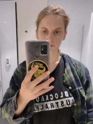 The protester, who goes by Holly Eckells on Facebook, was one of ten people arrested and taken to Surry Hills Police Station on Monday. Picture: Facebook / Holly Eckells