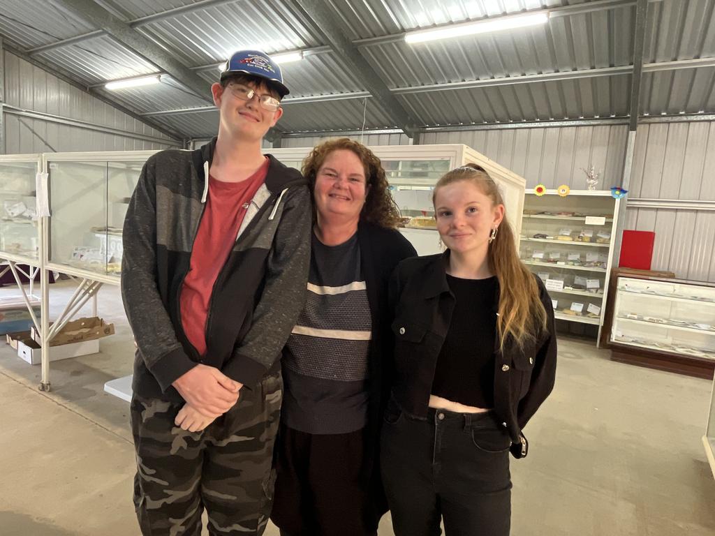 Sam, Julie and Luke Joynson looking at the cake display at the Fraser Coast Show.