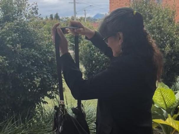 From right: Giget Leta Taylor walks out from the Gympie Magistrates court after being charged with producing and possession of dangerous drugs including possession of utensils on Monday.