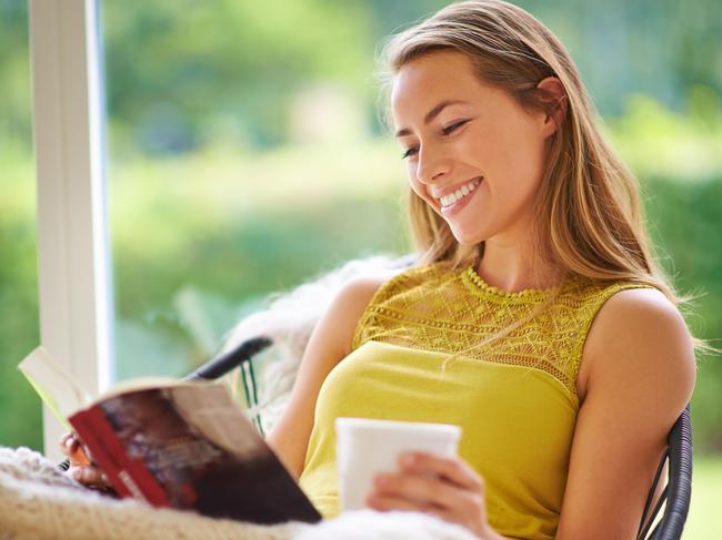 Shot of a young woman reading a book at homehttp://195.154.178.81/DATA/i_collage/pi/shoots/805669.jpg