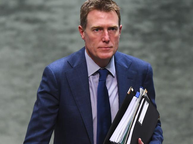 Australian Attorney-General Christian Porter reacts during a motion on the anniversary of the National Apology to Survivors and Victims of Child Sexual Abuse in the House of Representatives at Parliament House in Canberra, Tuesday, October 22, 2019. (AAP Image/Lukas Coch) NO ARCHIVING