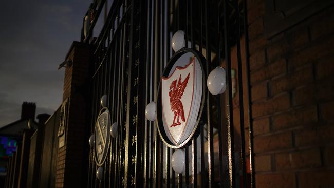 Dusk falls over The Paisley Gates at Anfield, the home Liverpool Football Club, whose fans have been waiting to see if the club will be named champions