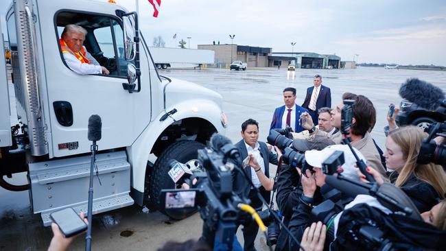 Donald Trump holds a press conference from inside a trash hauler at Green Bay Austin Straubel International Airport.