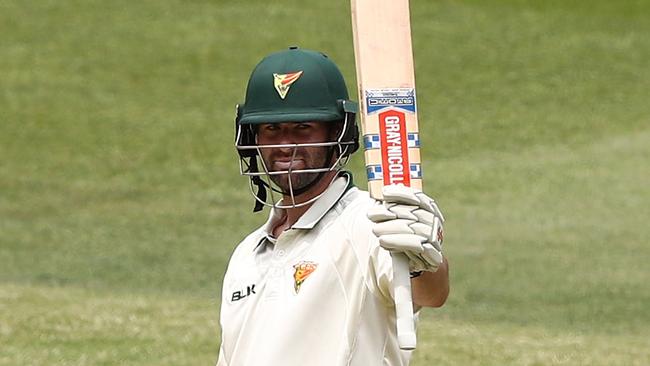 Tasmania’s Alex Doolan celebrates bringing up his double century at the MCG on Wednesday.