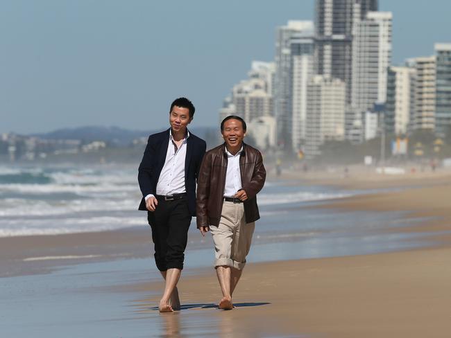 Tony Li and his father Riyu Li on the Gold Coast. The chairman of Ridong Group, Riyu Li moved his family to Australia in 2000.