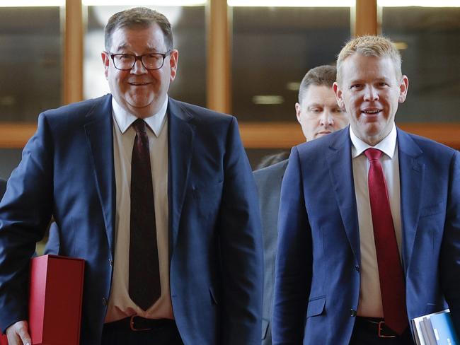 WELLINGTON, NEW ZEALAND - MAY 18: L to R, Minister Dr Megan Woods, Minister of Finance Grant Robertson and Prime Minister Chris Hipkins make their way to the house for budget day 2023 at Parliament on May 18, 2023 in Wellington, New Zealand. Budget 2023 is the fifth budget handed down by Finance Minister Grant Robertson, which includes a $941 million flood and cyclone recovery package and a plan to address the cost of living crises. (Photo by Hagen Hopkins/Getty Images)